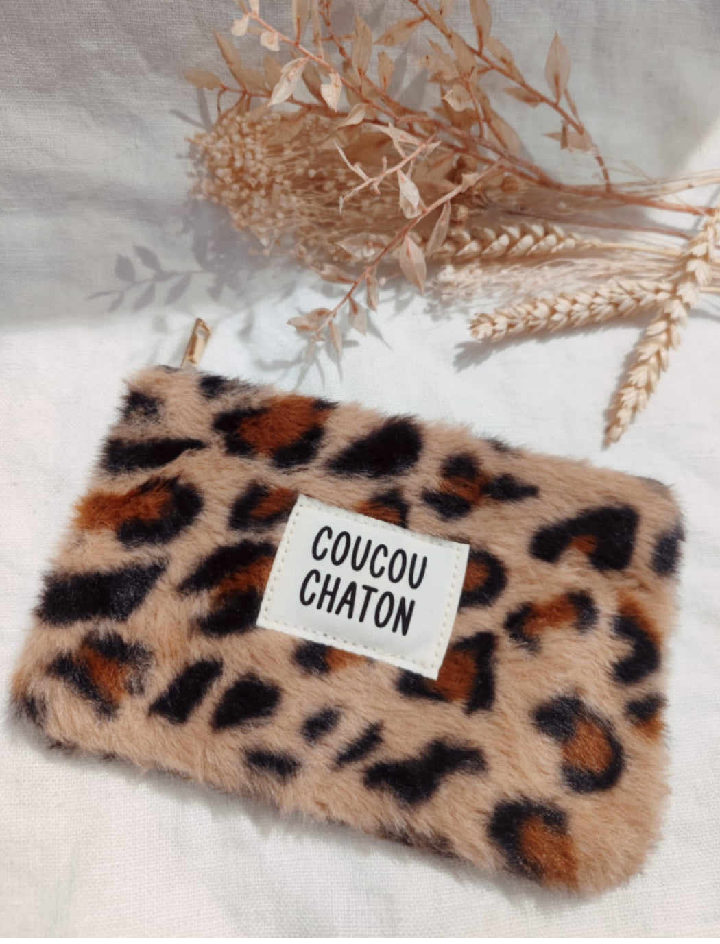Pochette moumoute léopard
